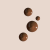 Medium Neutral Brown, Spill - Cream Background.png